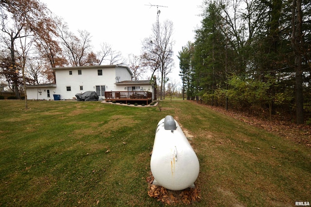 view of yard with a deck