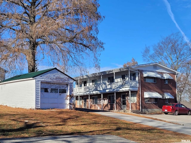 view of front of house with a balcony and a garage