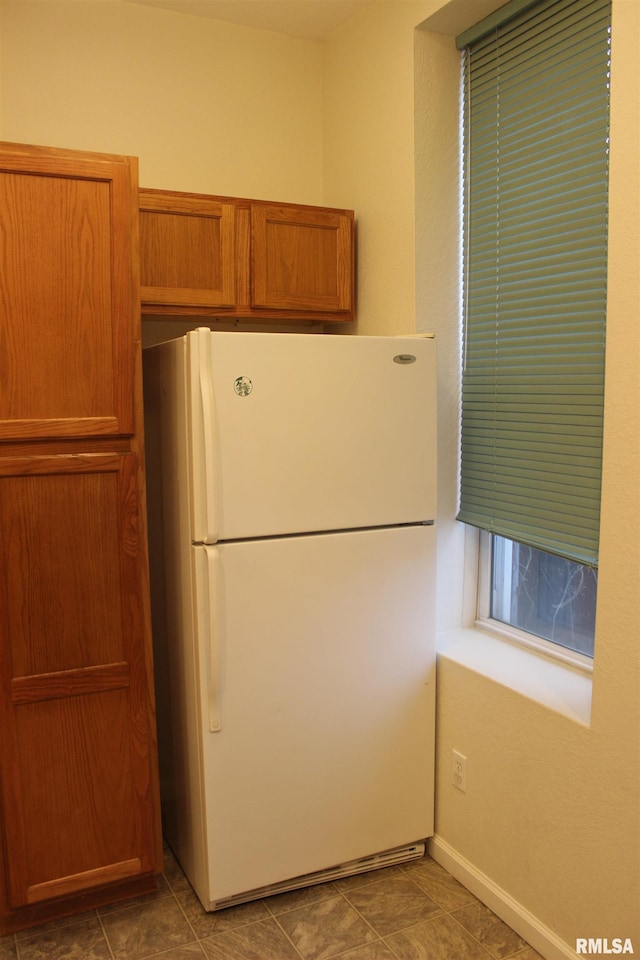 kitchen featuring white refrigerator