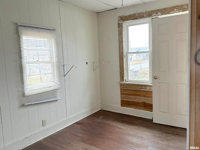 unfurnished room featuring dark hardwood / wood-style floors