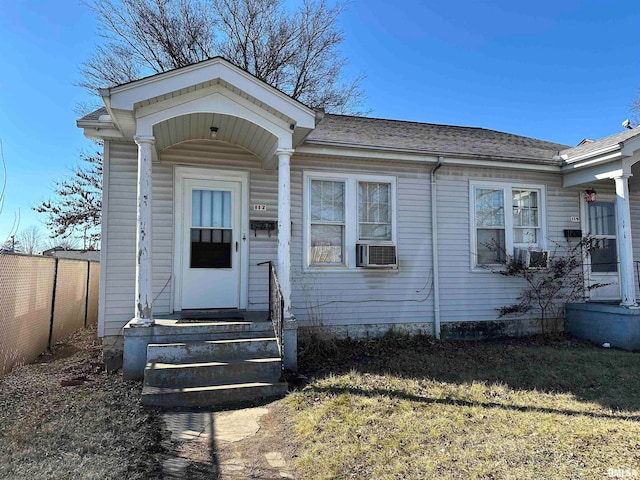 view of front of home with a front lawn