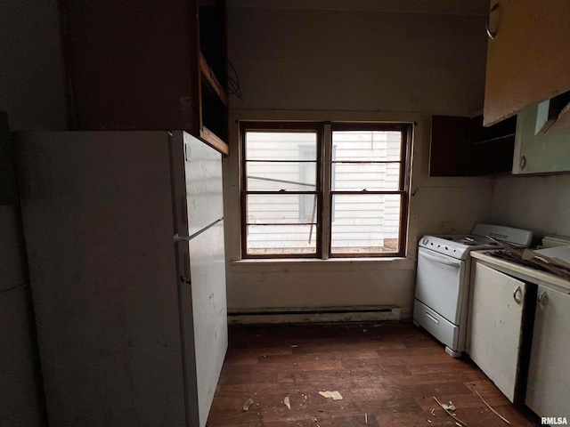 kitchen with dark hardwood / wood-style floors and washer and clothes dryer