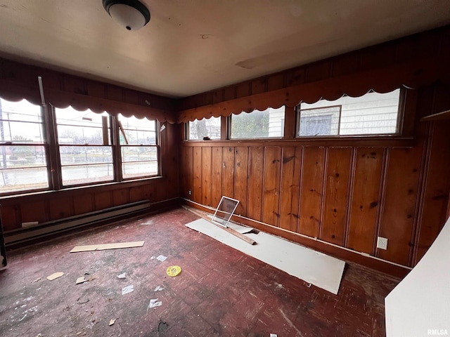 empty room with a baseboard heating unit