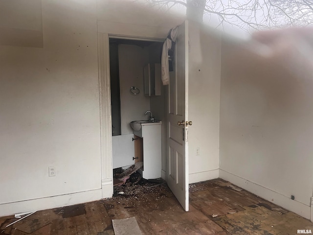 unfurnished bedroom featuring sink