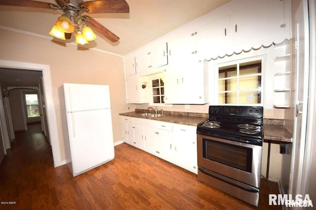 kitchen featuring ceiling fan, white cabinets, dark wood-type flooring, white fridge, and stainless steel range with electric cooktop