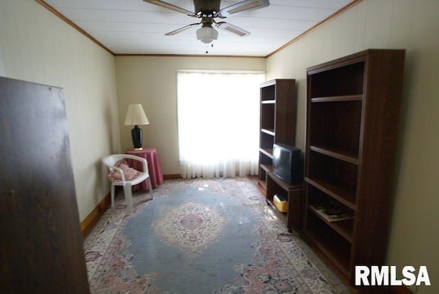 interior space featuring ceiling fan, crown molding, and a wealth of natural light