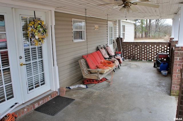 view of patio featuring ceiling fan