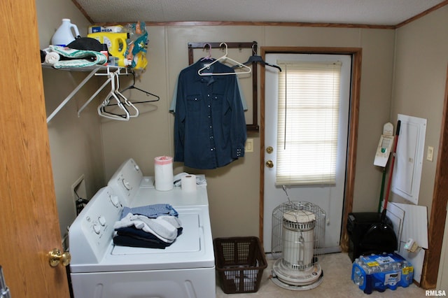 clothes washing area featuring a textured ceiling, independent washer and dryer, and hookup for a washing machine