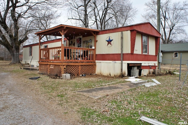 view of front of house featuring a wooden deck