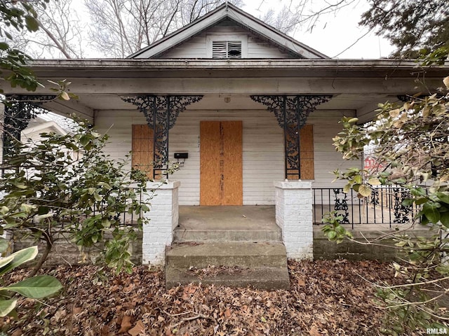 property entrance with a porch