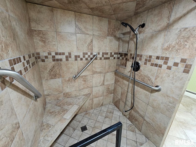 room details featuring tiled shower