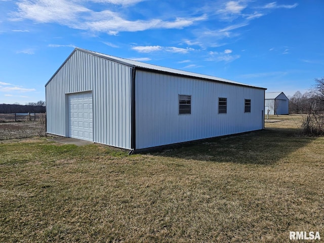 garage featuring a yard