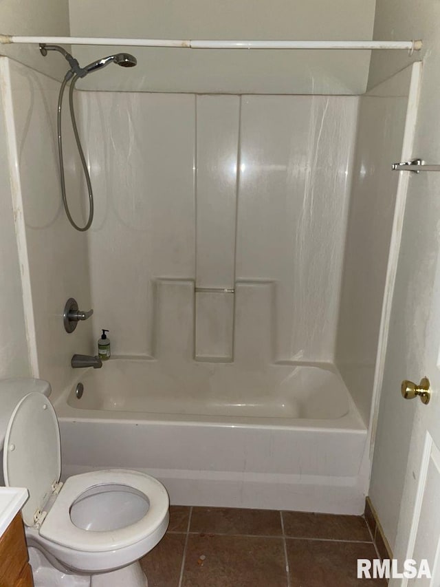 full bathroom featuring vanity, tile patterned floors, shower / bathtub combination, and toilet