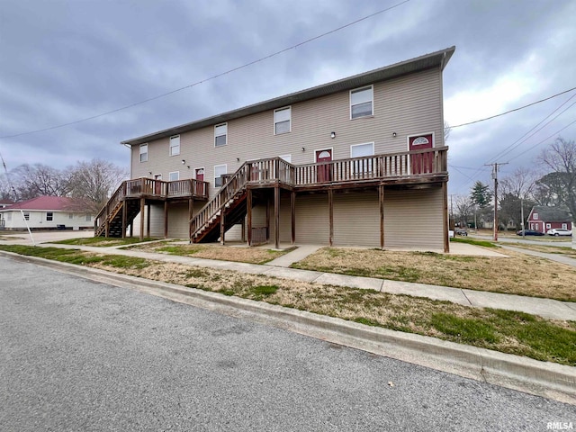 rear view of property with a deck