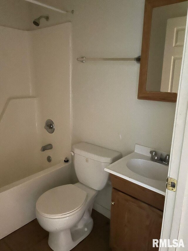 full bathroom with shower / tub combination, vanity, and toilet