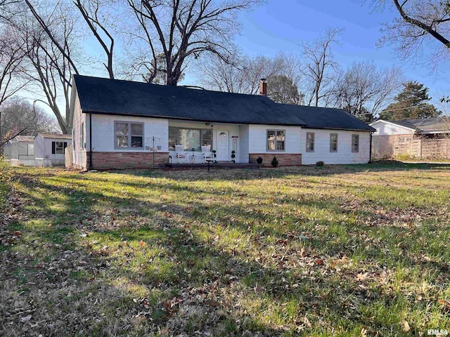 view of front of property with a front lawn