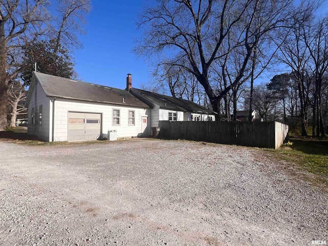 exterior space with a garage