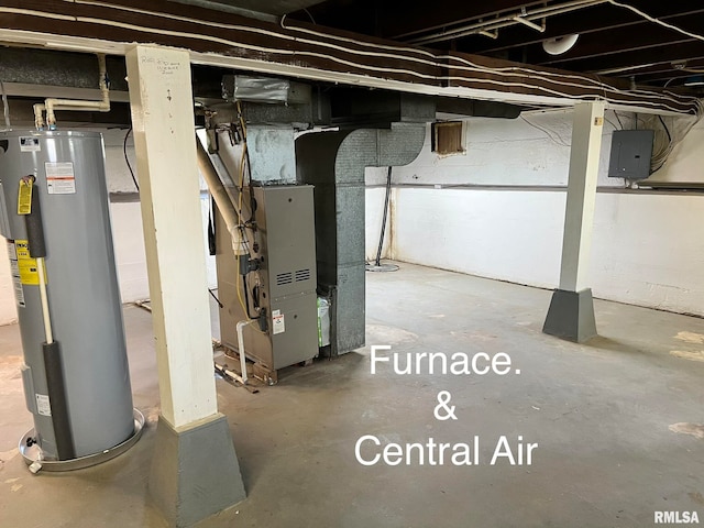 basement featuring water heater and heating utilities