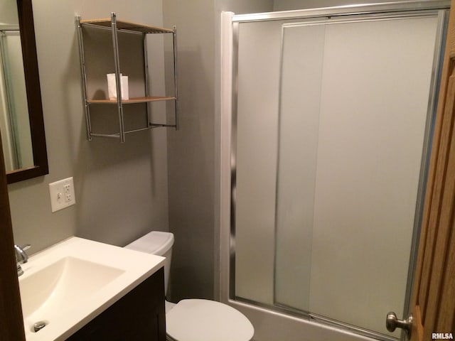 bathroom with oversized vanity and toilet