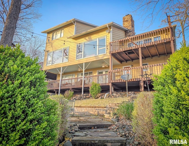 rear view of house with a deck