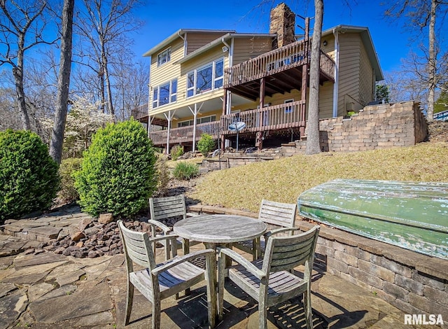 view of patio / terrace featuring a wooden deck