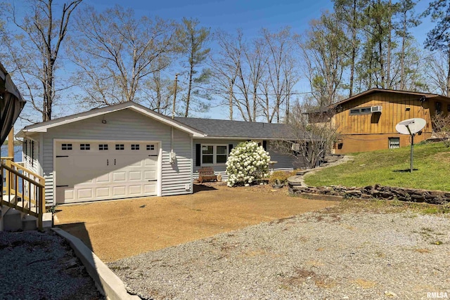 ranch-style home with a front lawn and a garage