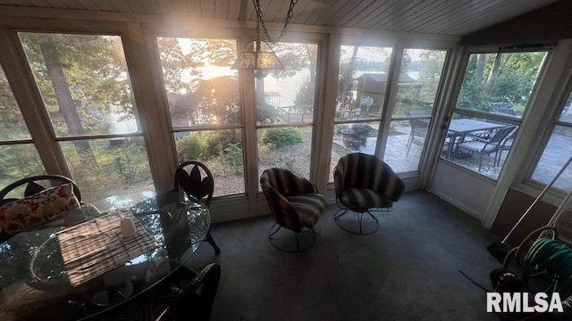 sunroom / solarium with lofted ceiling