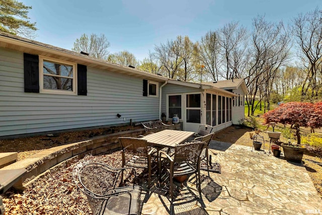 view of patio / terrace with a sunroom