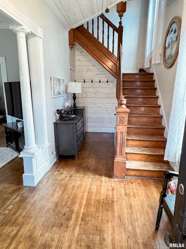 staircase featuring hardwood / wood-style floors