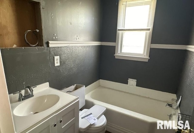 kitchen featuring crown molding, white cabinets, sink, and dark hardwood / wood-style flooring