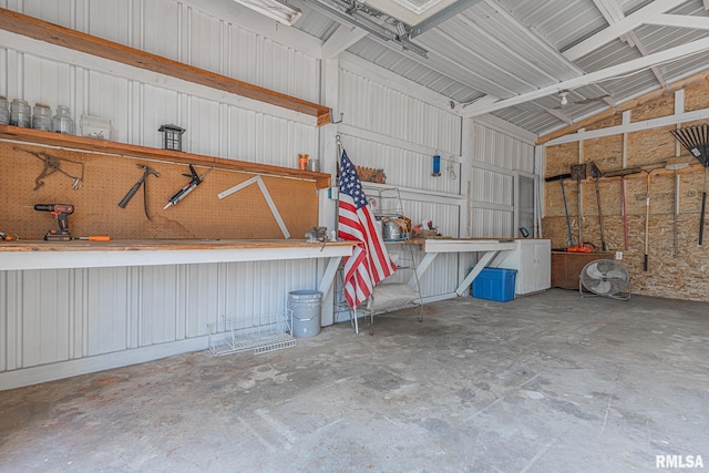 garage with a workshop area