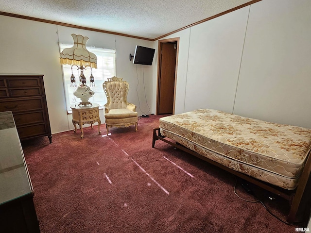 carpeted bedroom featuring crown molding and a textured ceiling