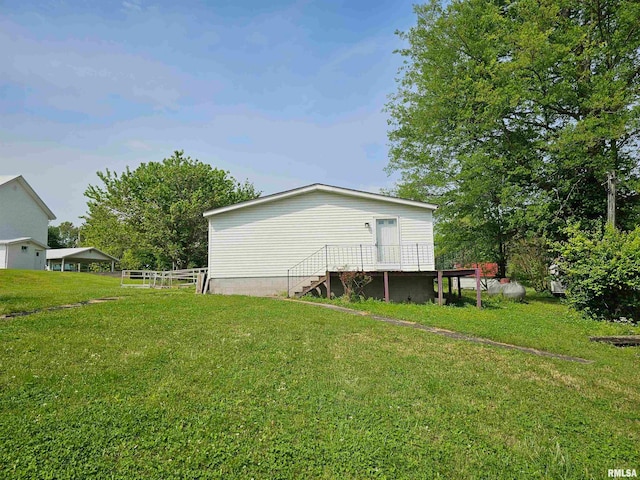 view of yard featuring a deck