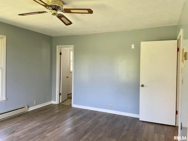 unfurnished bedroom with ceiling fan, dark hardwood / wood-style flooring, a baseboard radiator, and a textured ceiling