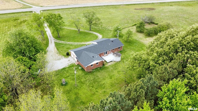 birds eye view of property with a rural view