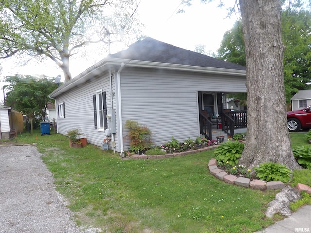 view of home's exterior featuring a lawn