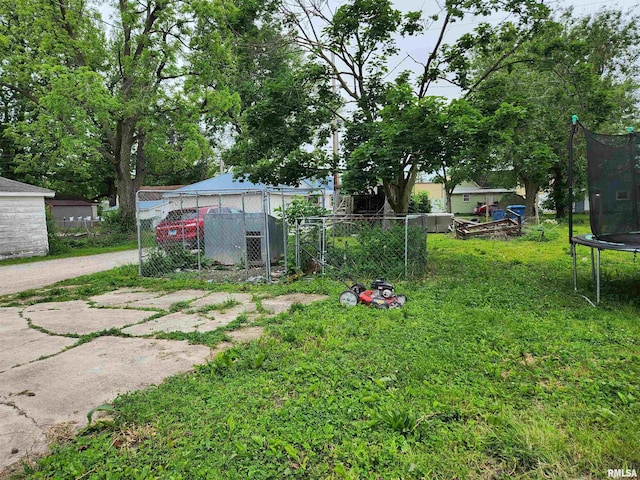 view of yard featuring a trampoline