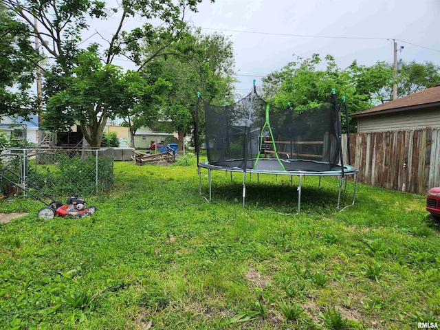 view of yard featuring a trampoline