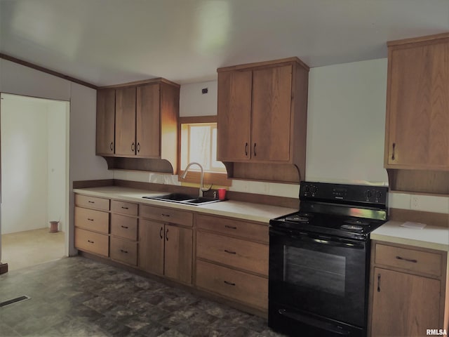 kitchen with sink and black range with electric cooktop