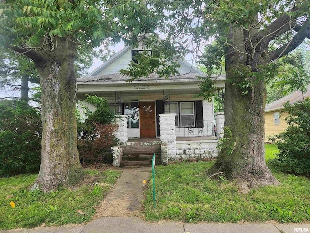 view of front of home featuring covered porch