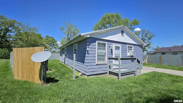 84 Yakima Cir, Mcclure, IL 62957 - view of property exterior with a yard