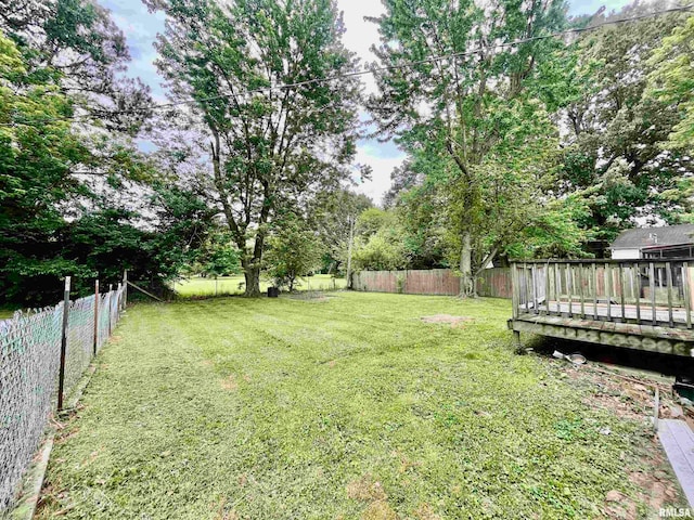 view of yard with a deck