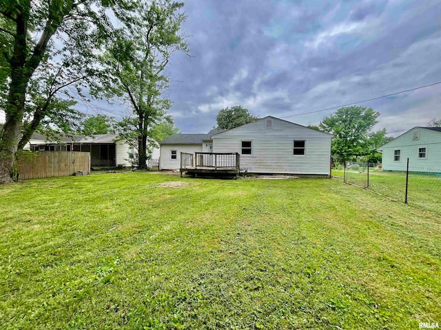 view of yard featuring a wooden deck