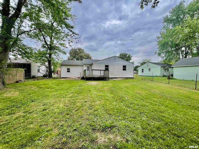 view of yard featuring a wooden deck