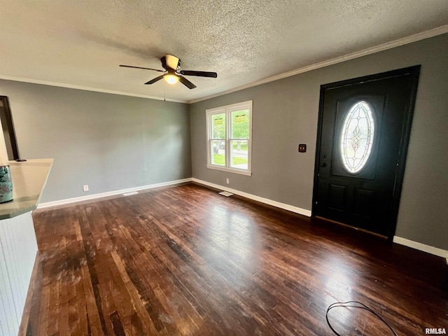 entryway featuring crown molding, a textured ceiling, ceiling fan, and dark hardwood / wood-style flooring