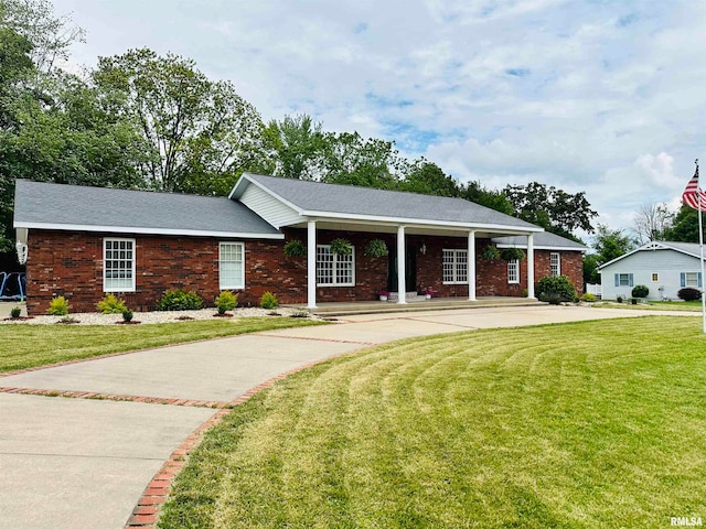 ranch-style house with a front yard