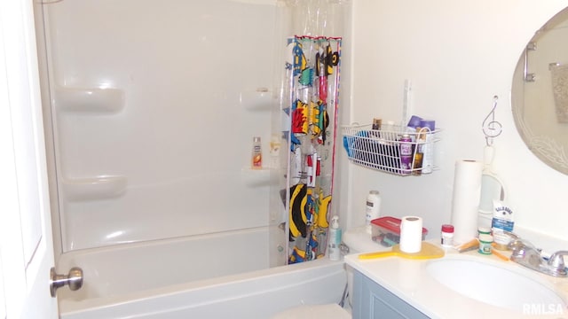 bathroom featuring shower / tub combo with curtain and vanity