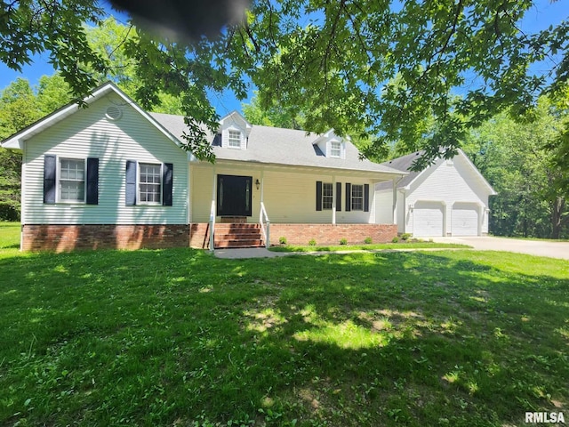 cape cod home with a garage and a front yard