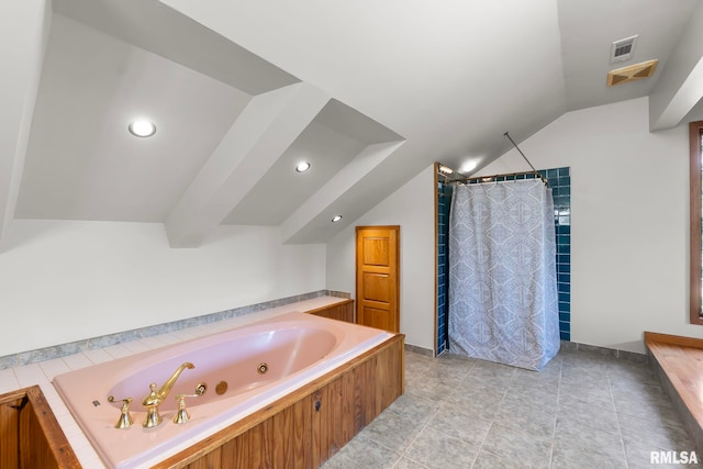 bathroom with tile flooring and vaulted ceiling with beams