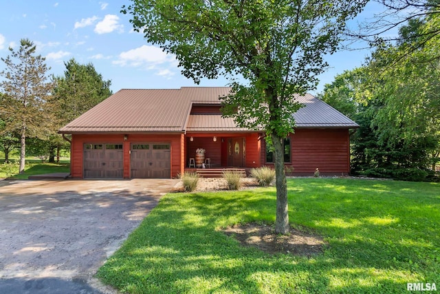 view of front of property featuring a front lawn, a garage, and a porch